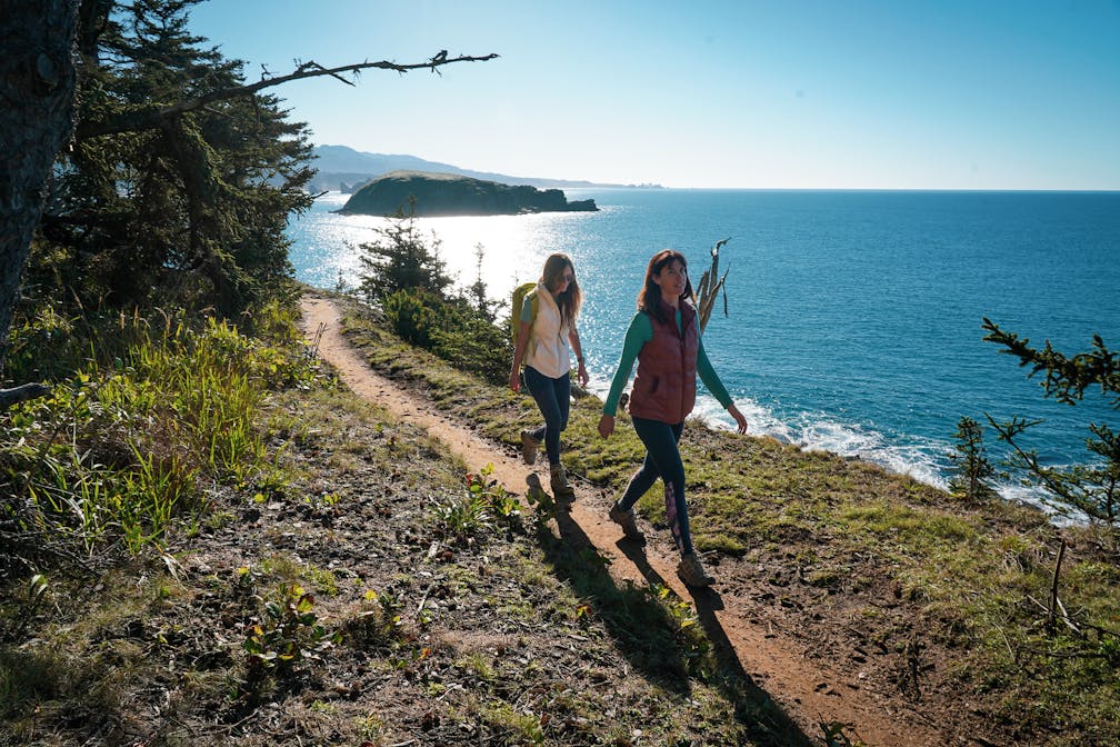 Hikers on Cape Sebastian Coastal Trail on the Oregon Coast near Gold Beach 