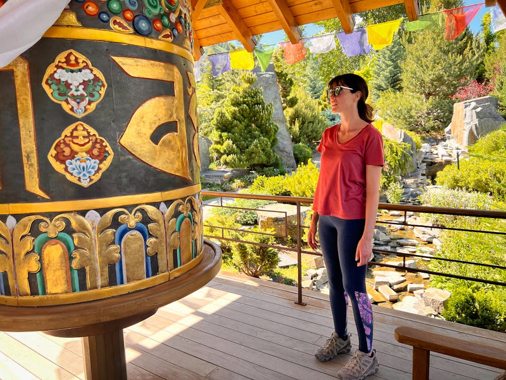 Person in peace garden looking at peace wheel in Sun Valley Idaho 