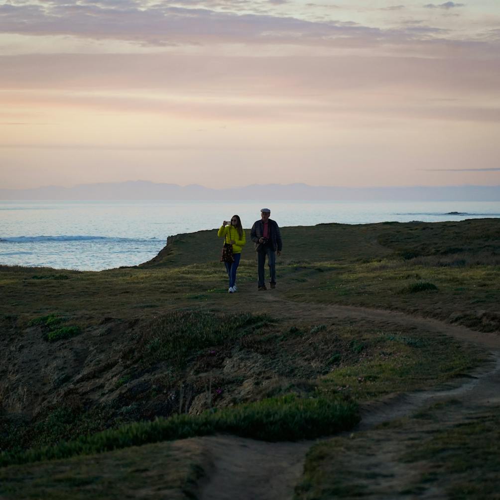 hikers at Point Cabrillo Light Station Mendocino coast