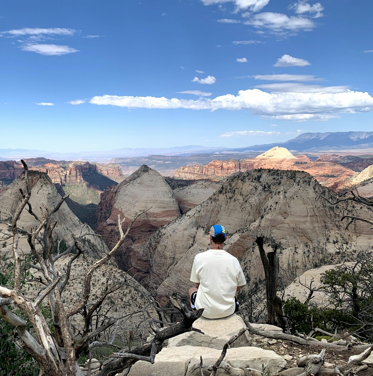 Backpacker enjoying the Zion National Park scenery and sunset.