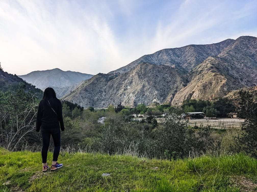 hiker overlooking the scenery at Azusa River Wilderness Park in the San Gabriels