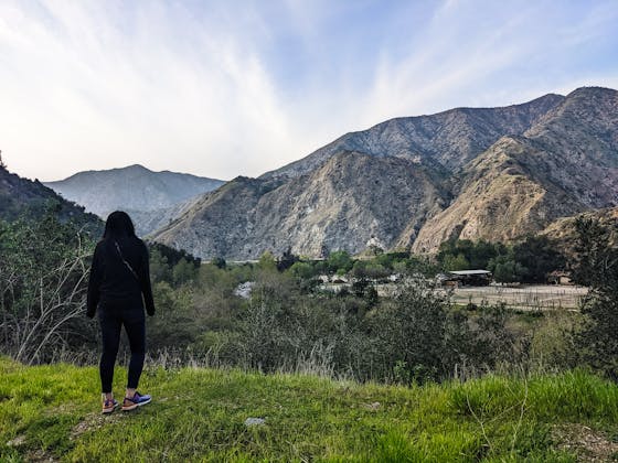 hiker overlooking the scenery at Azusa River Wilderness Park in the San Gabriels