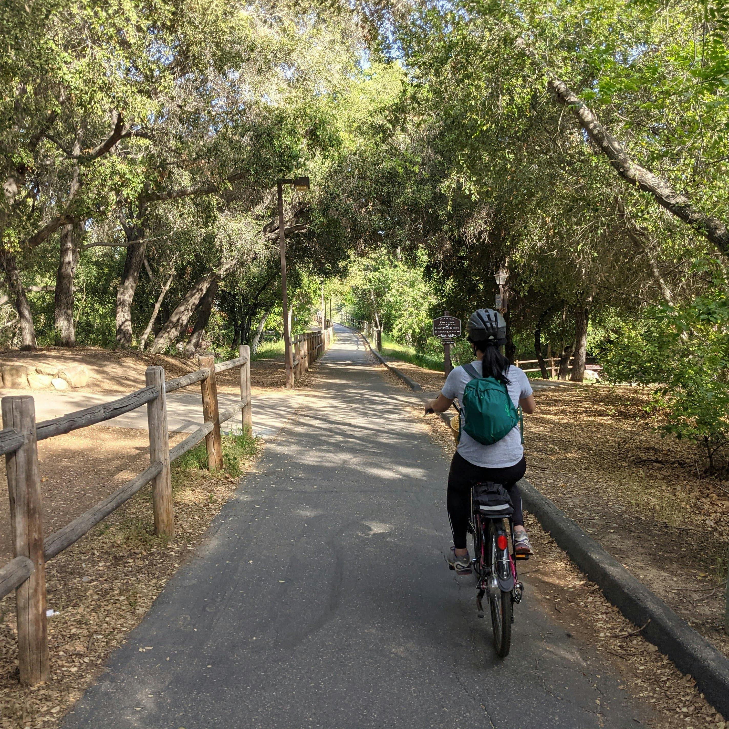 Woman riding her bike on the Ventura to Ojai bike path 
