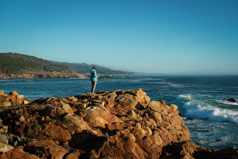 woman on rocks at Salt Point State Park Sonoma Coast