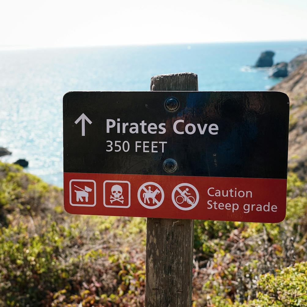 Sign pointing the way to Pirates Cove beach in the Marin Headlands 