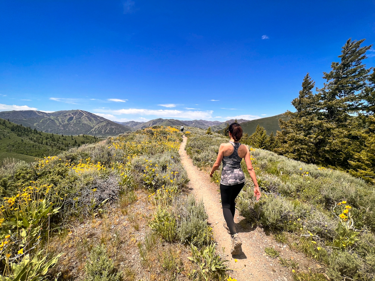 Hiker on ridge at Proctor Mountain Trail in Sun Valley Idaho 