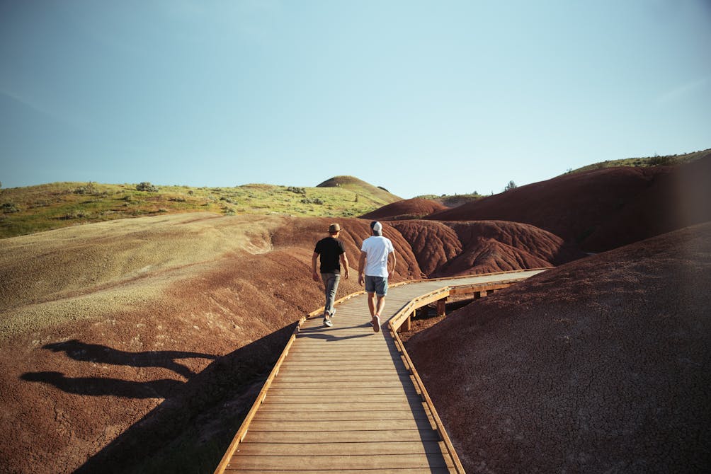 guys hiking the Painted Hills in Eastern Oregon