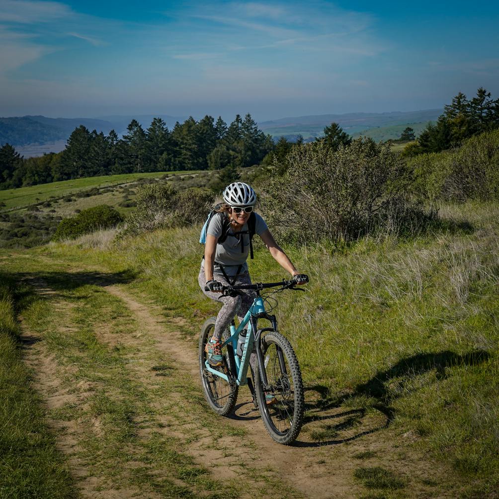woman biking bolinas ridge trail point reyes