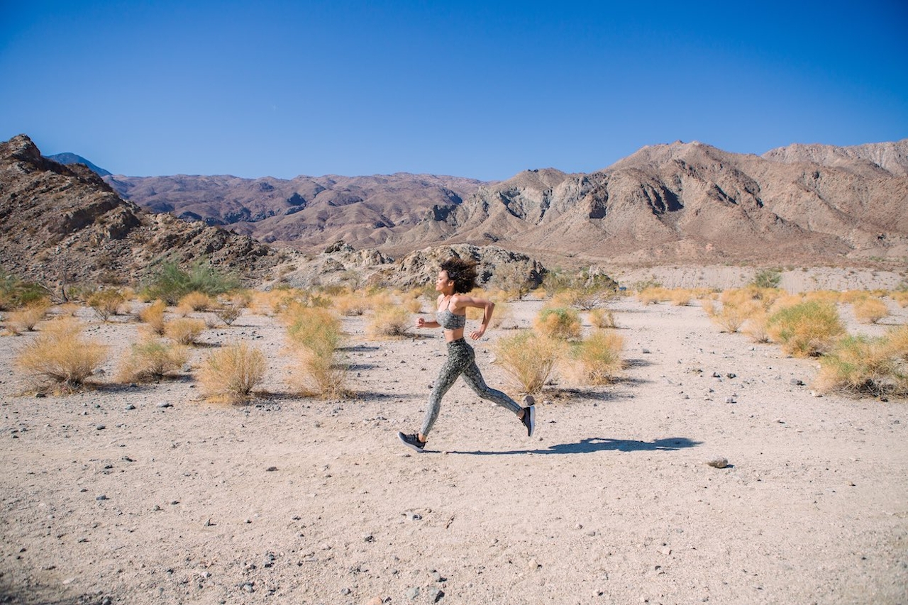 Woman running in desert La Quinta