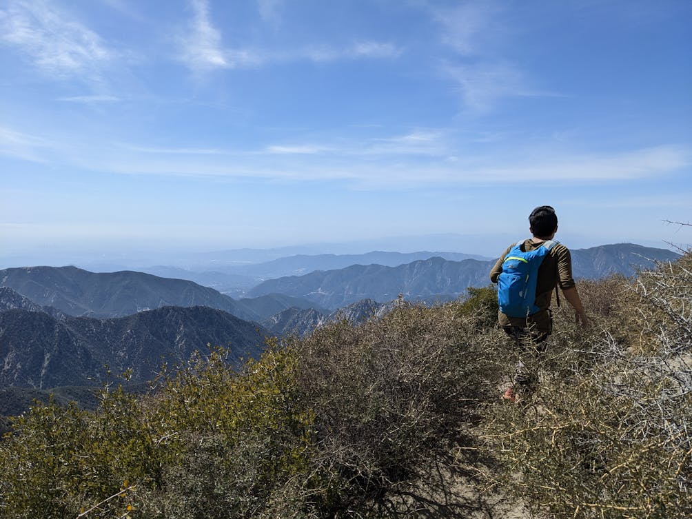 Hiker going down from Strawberry Peak in the San Gabriel Mountains 