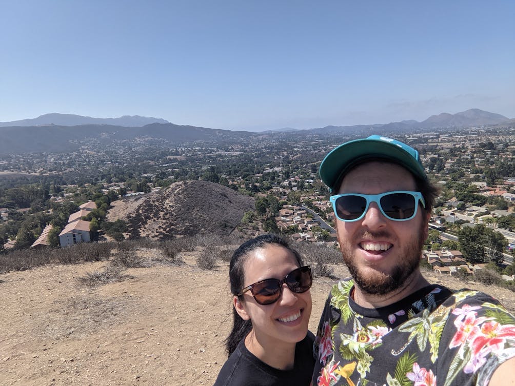 A couple taking a selfie at Dawn Peak on Tarantula Hill overlooking the Santa Monica Mountains 