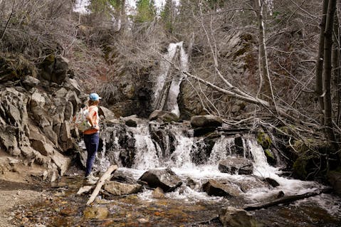hiker at Hunter Creek Falls in Reno