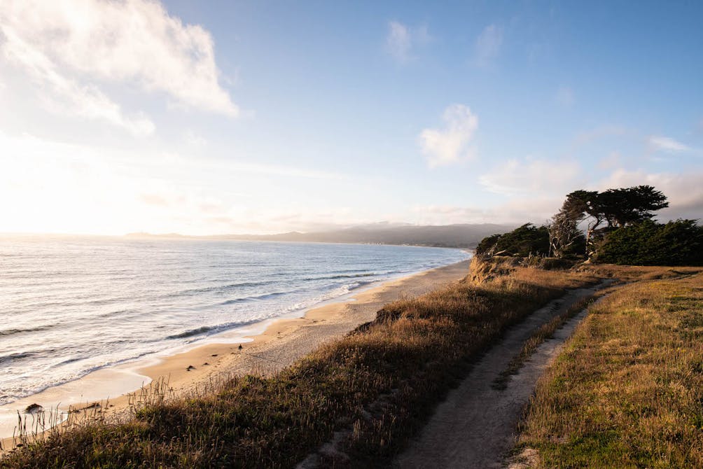 POST 2023 hiking calendar beach at sunset