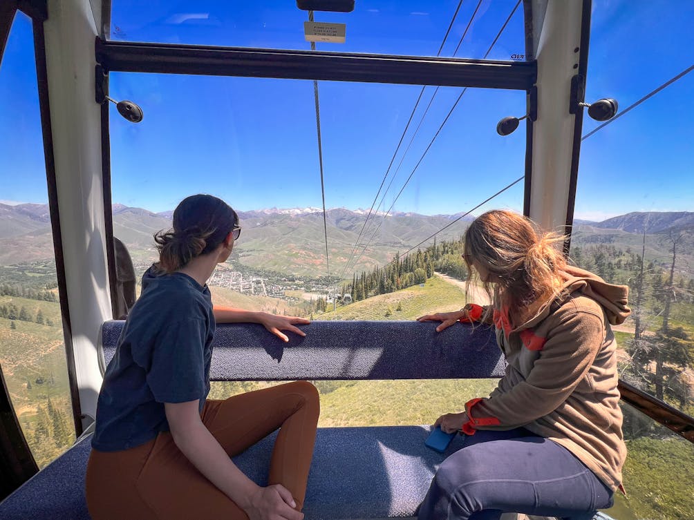 Two people inside a gondola on the Roundhouse Gondola in Sun Valley Idaho 