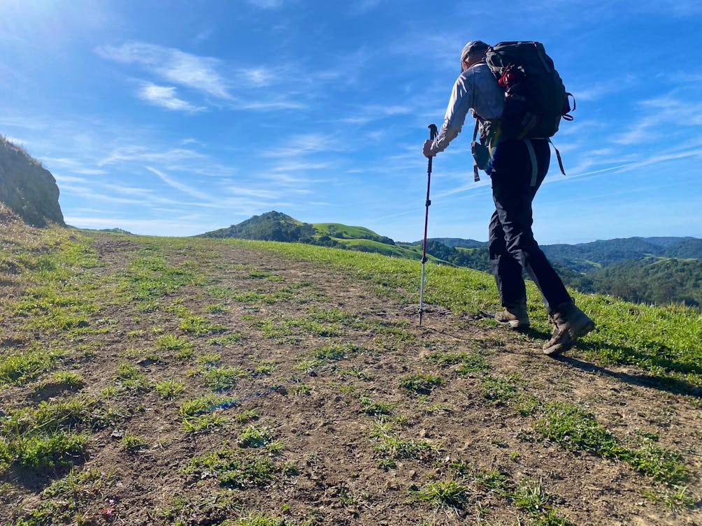 Hiker going up at trail at Carr Ranch in Contra Costa County 
