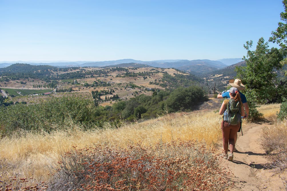 Hikers on the trail at Volcan Mountain Wilderness Preserve in San Diego County 