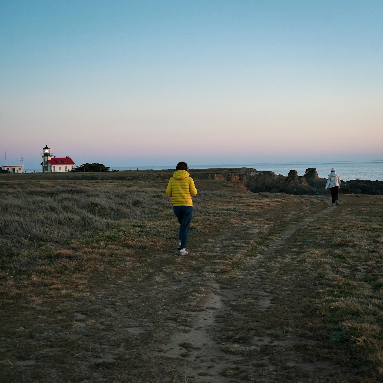 hikers at Point Cabrillo Light Station Mendocino Coast