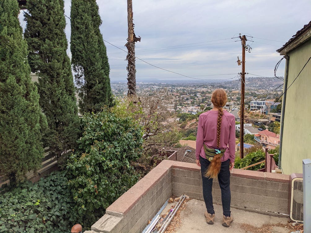 Woman overlooking the scenery on a stairway walk in La Mesa San Diego 