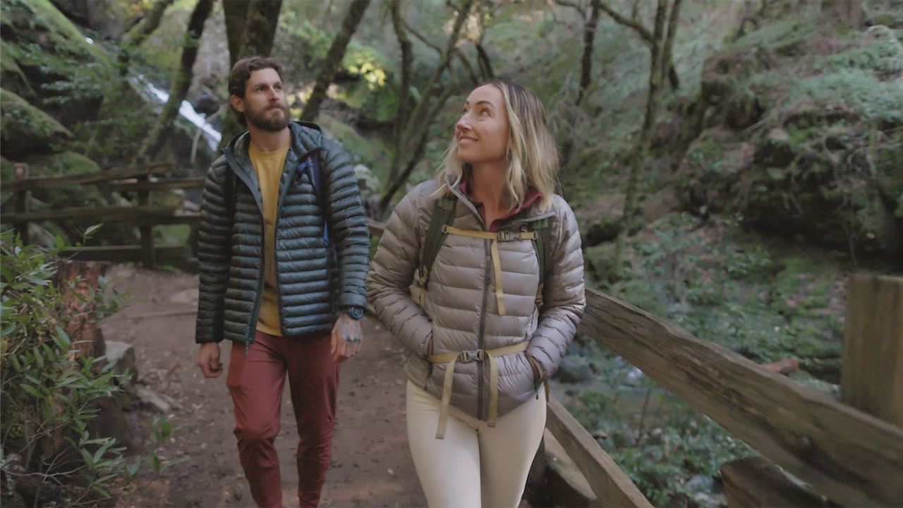 couple hiking in redwoods in Marin