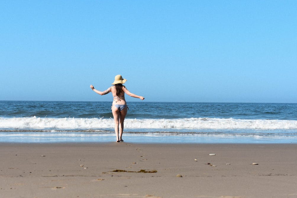 Person enjoying El Capitan State Beach near Santa Barbara 
