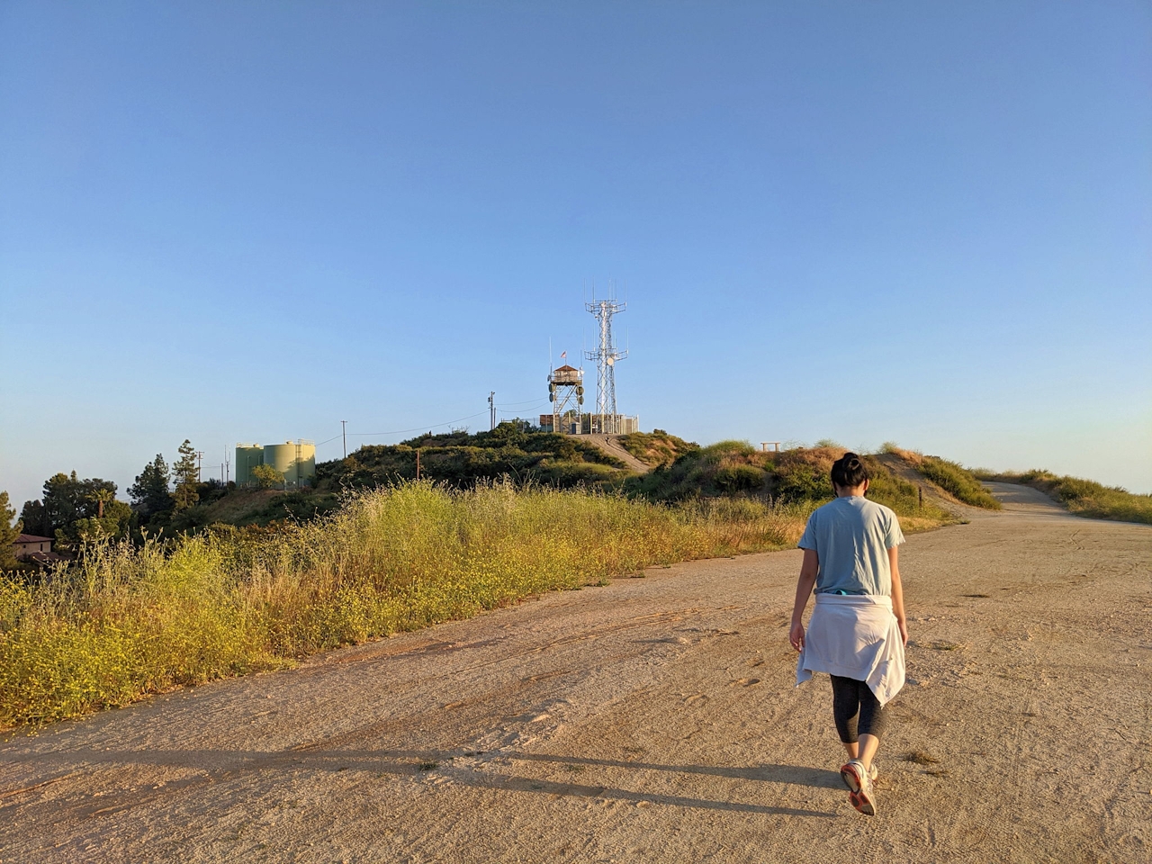 Hiker heading up the hill at Cherry Creek Canyon Park in Los Angeles