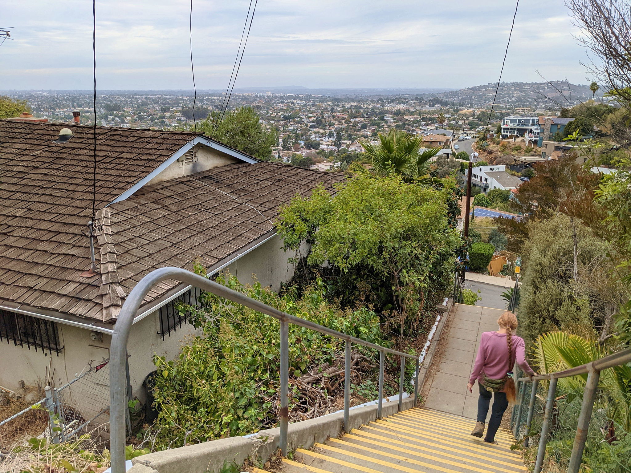 Woman walking down in a stairway in La Mesa San Diego County 