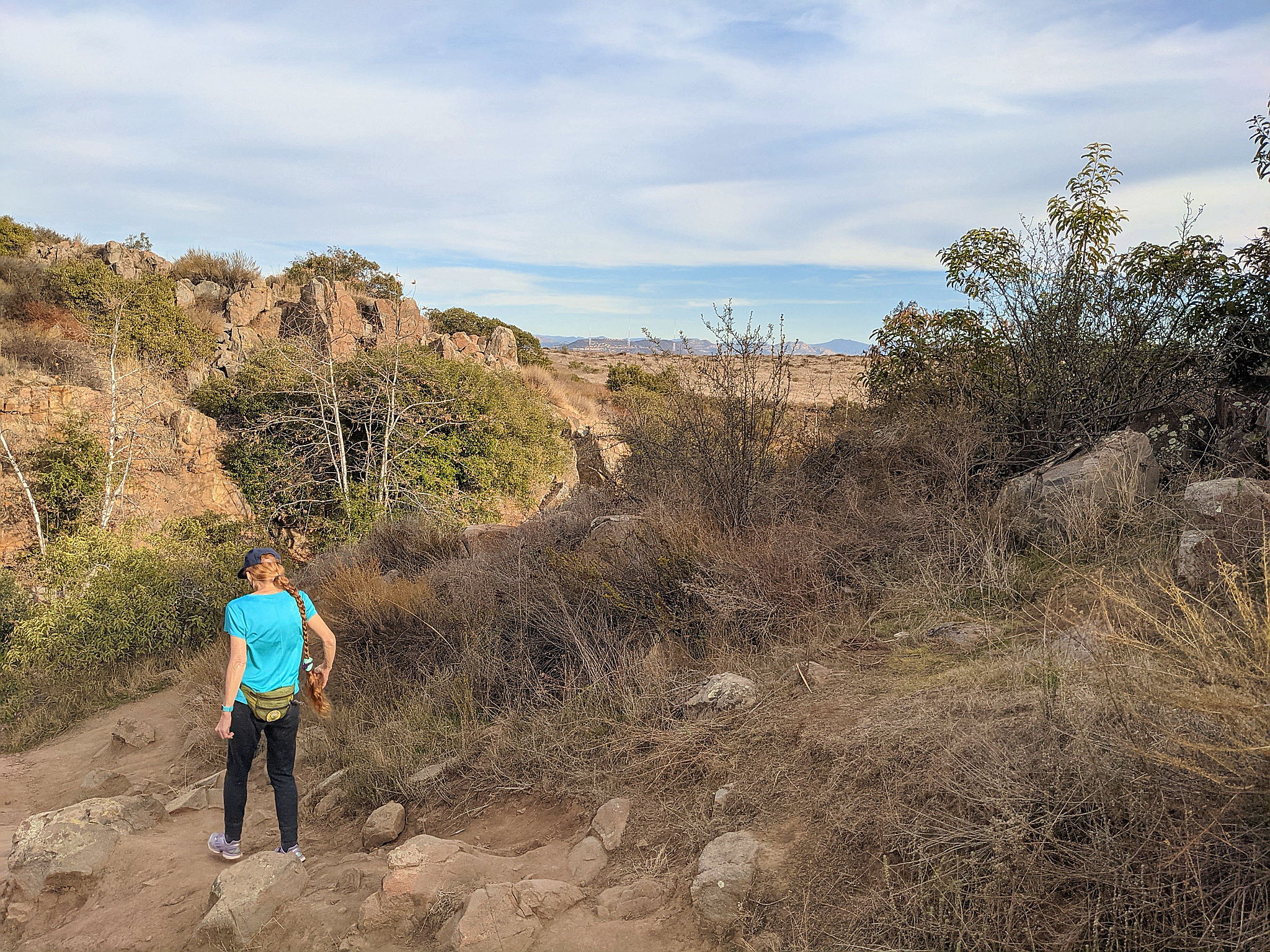 Woman hiking a trail 