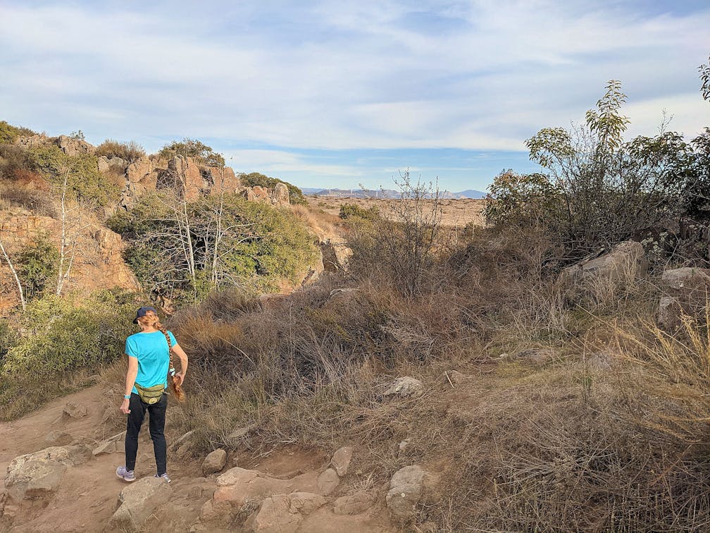 Woman hiking a trail 