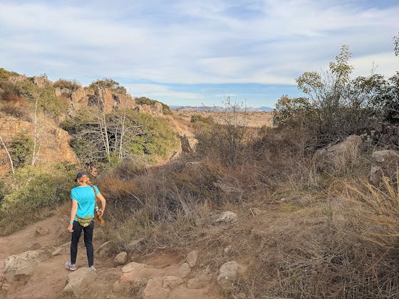 Woman hiking a trail 