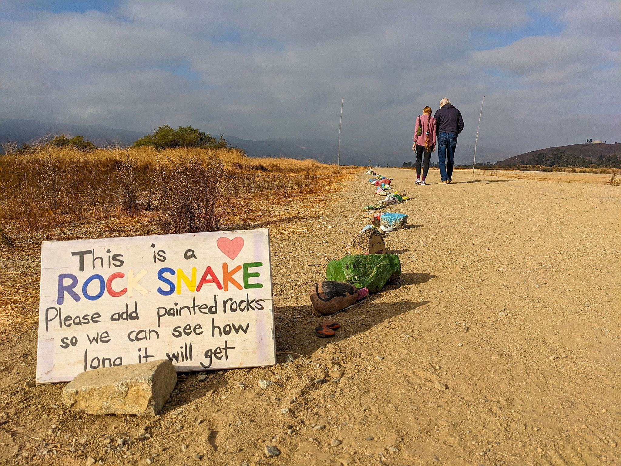 Woman and Man hiking at Lake Elsinore in Southern California