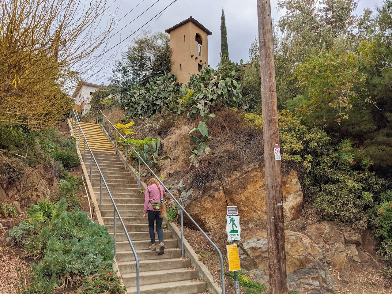 Woman walking up stairs in La Mesa San Diego 