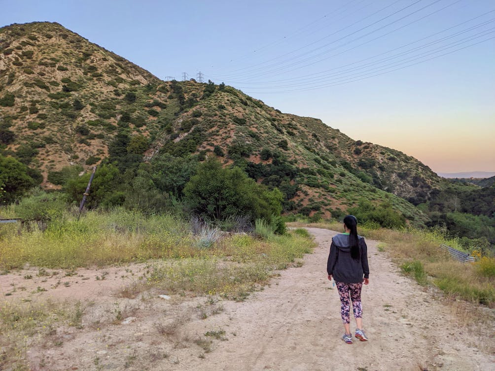 Woman hiking at Gould Mesa Camp 
