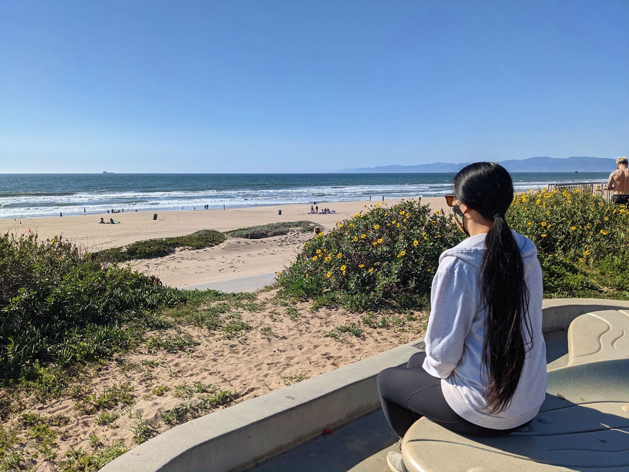 Woman sitting at on overlook at Bruce