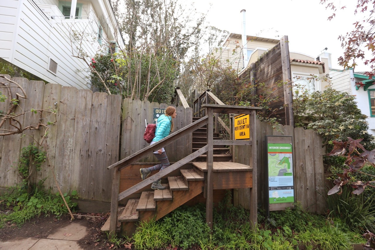 Hiker going up stairs to enter Mount Sutro in San Francisco