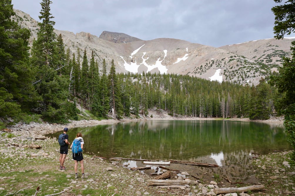 Two people checking out a lake at Great Basin National Park Nevada 