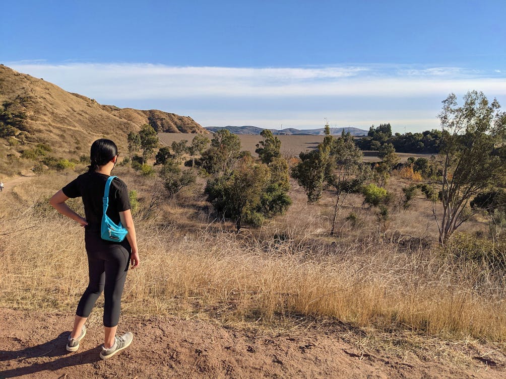 Woman hiking at Santiago Oaks Regional Park in Orange County 