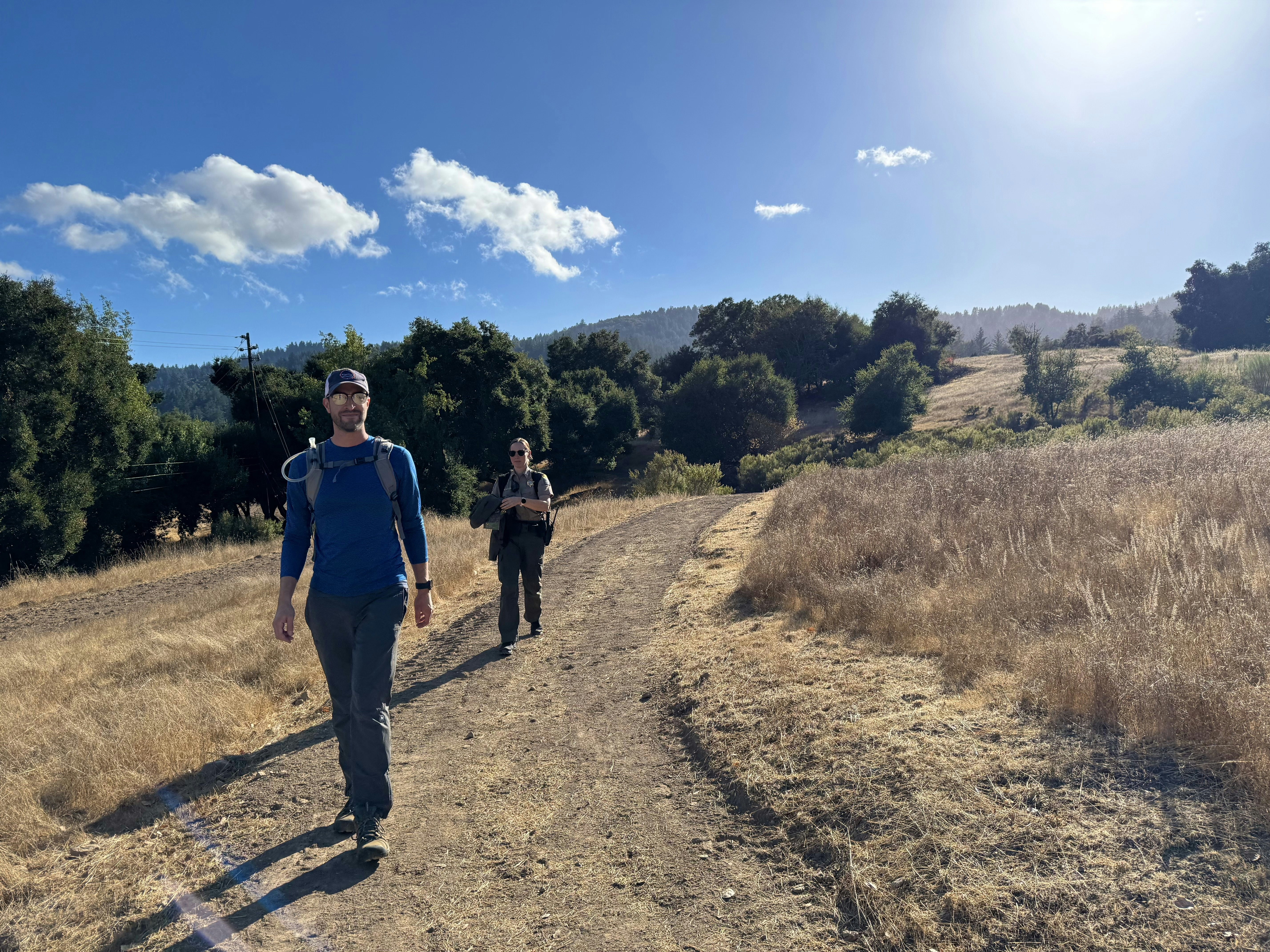 Two hikers at Bear Creek Redwoods Regional Preserve on a new trail.