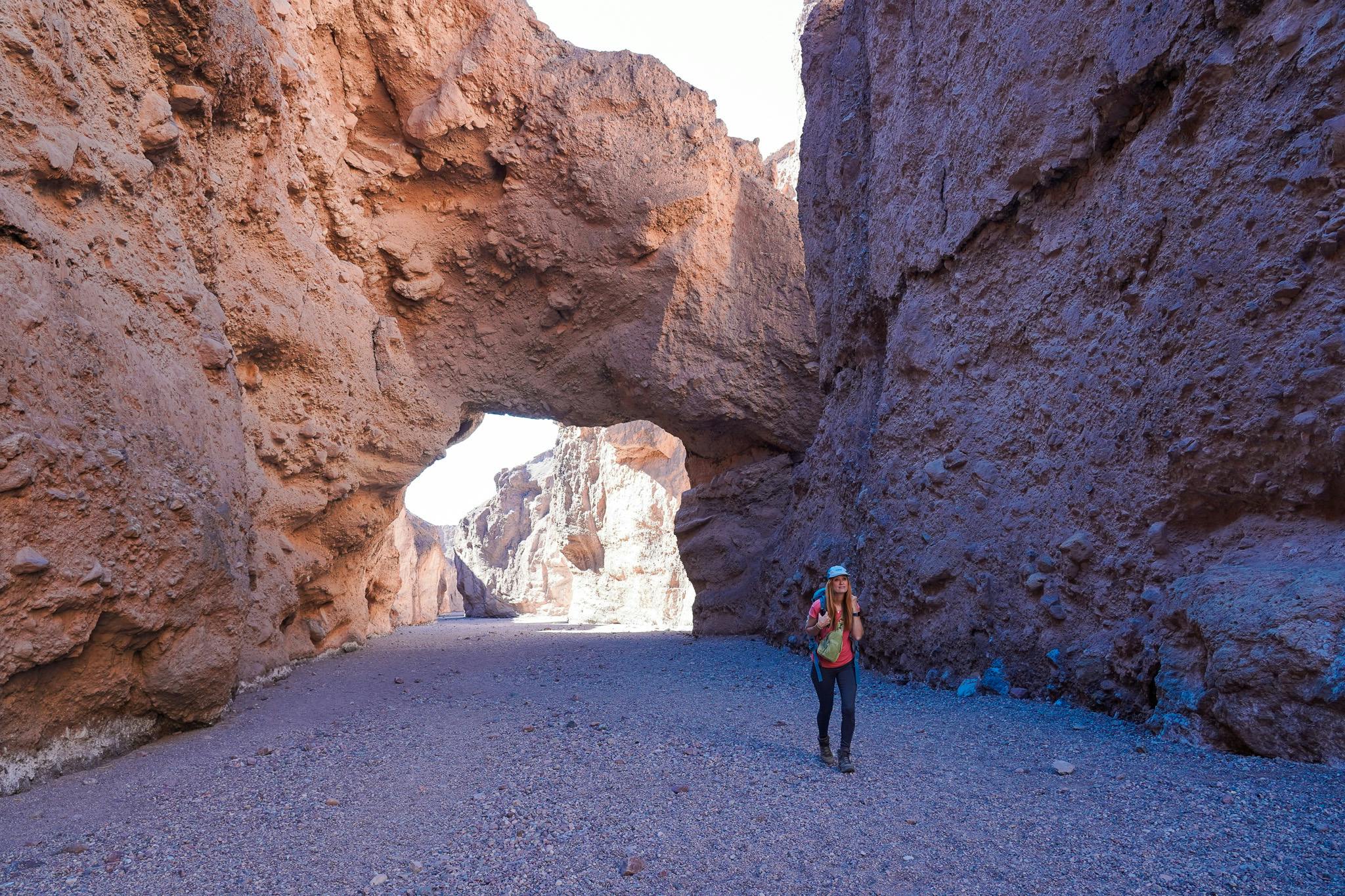 Woman hiking at Natural Bridge in Death Valley National Park