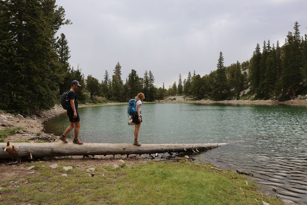 Two people checking out a lake at Great Basin National Park Nevada 