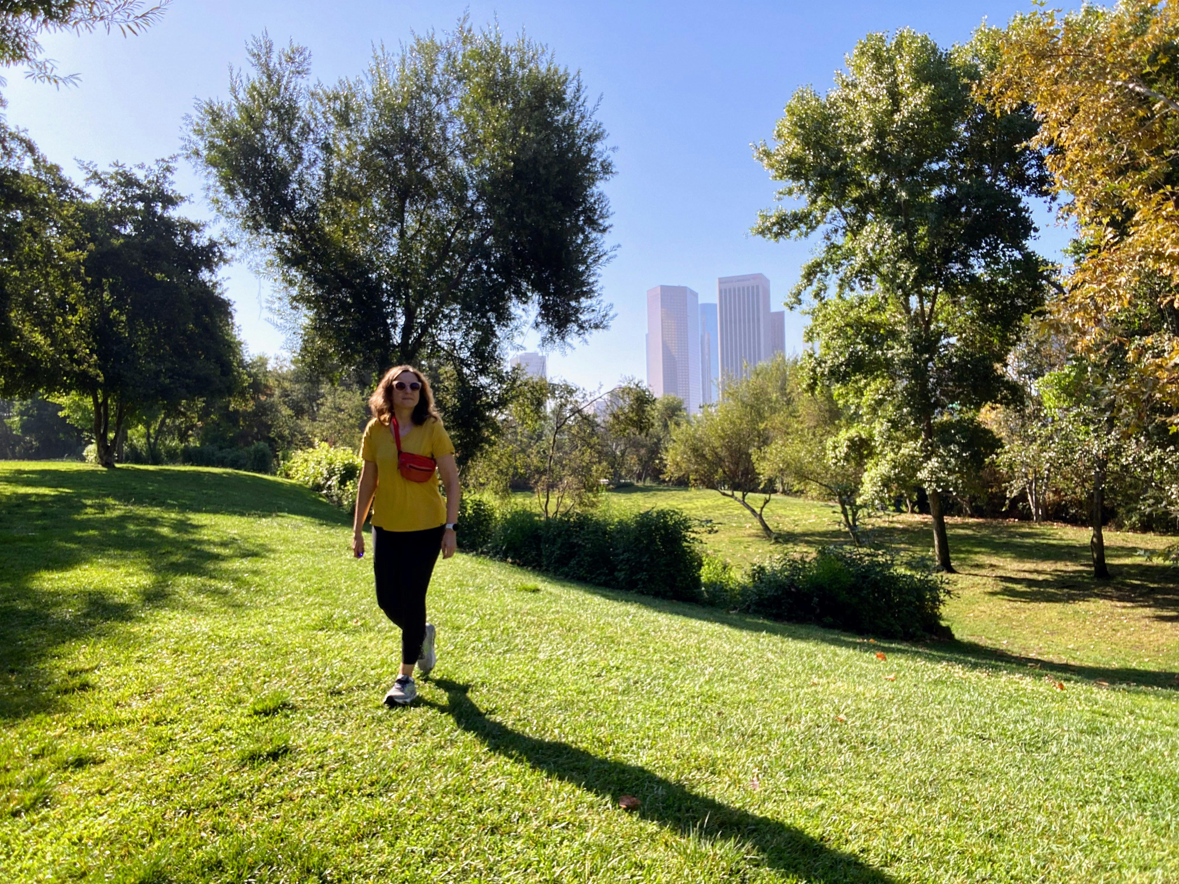 Woman on grassy lawn at Vista Hermosa Park in Echo Park Los Angeles 