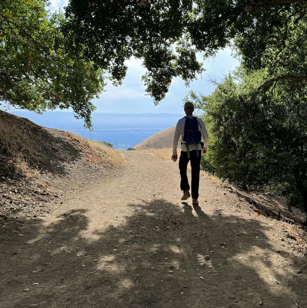 Man hiking a trail at Sierra Vista Open Space Preserve