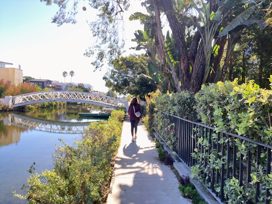 Woman walking in the Venice Canals of Los Angeles County