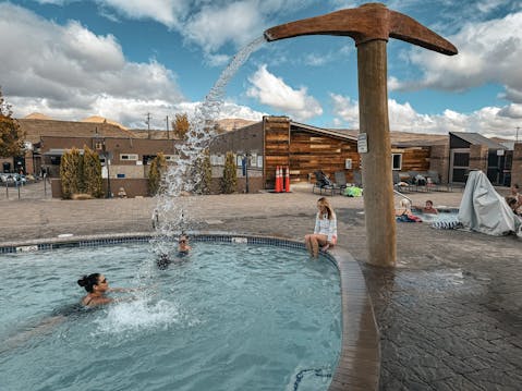 Woman swimming in Carson Hotsprings natural thermal pool