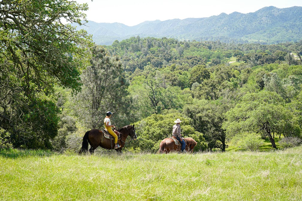 People on a guided horseback tour with Central Coast Trailrides at Santa Margarita Ranch near Paso Robles