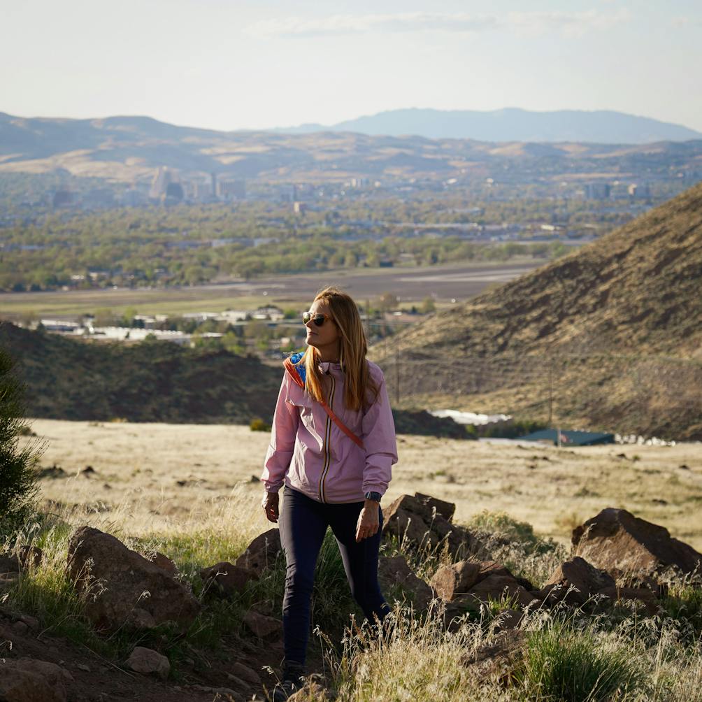 A woman hiking a trail at Huffaker Hills Open Space in Reno 
