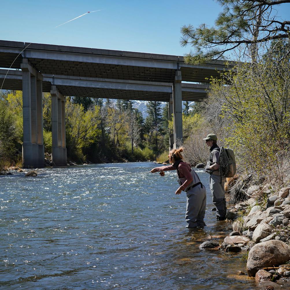 Two people fly fishing on the Truckee River with guides from Reno Fly Shop