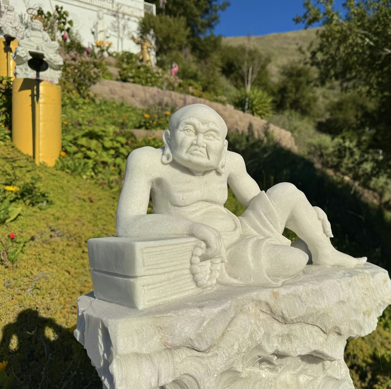 Buddha statues on the hillside at Dragon Mountain Park 