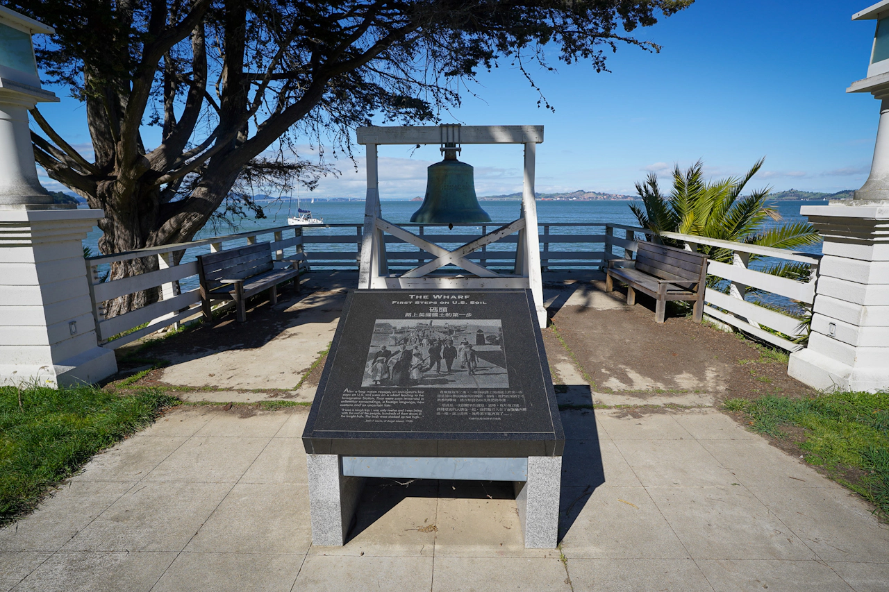 A massive bell at edge of the water at the Angel Island Immigration Station on Angel Island State Park