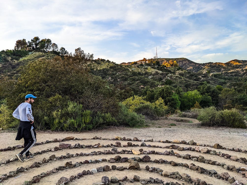 Hiker at a labyrinth in Griffith Park near Bronson Caves in Los Angeles 