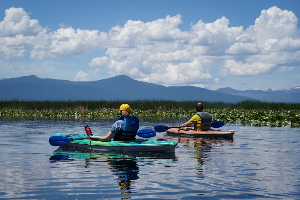 Two kayakers on Upper Klamath Basin on tour with Sky Lakes Wilderness Adventures